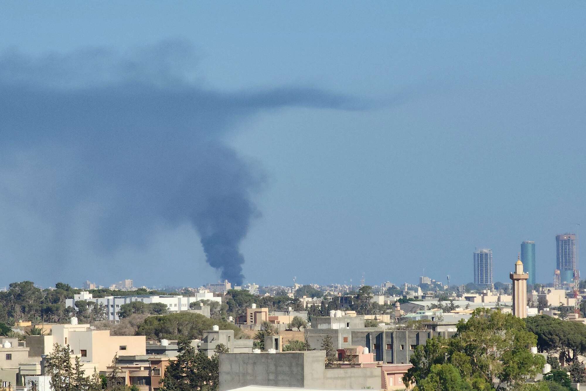 Two dead, airport shut after gunfight erupts in Libya capital - Vimarsana News