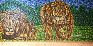  camouflaged lion