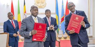 Presidents Yoweri Museveni and Paul Kagame 
