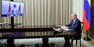 Russian President Vladimir Putin attends a meeting with US President Joe Biden 