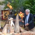 Kenyan paleoanthropologist Richard Leakey sets rhino horns on fire at a zoo in the Czech Republic in 2017.