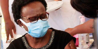 Uganda Health Minister Jane Ruth Aceng receives Covid-19 vaccine.