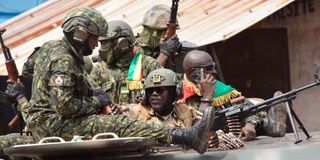 Soldiers in Guinea's capital Conakry on September 5, 2021, following the coup.