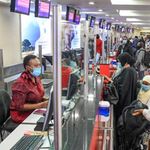 Passengers check in at Jomo Kenyatta International Airport, Nairobi.