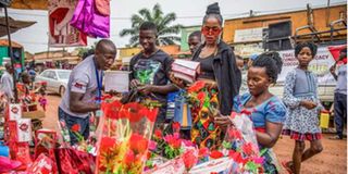 Shoppers admire Valentine's gifts.