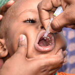 A child receives polio vaccine.