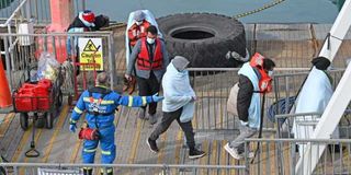 Migrants cross the English Channel.
