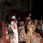 Thespians act out a scene in a historic play, "Ngaahika Ndeenda" ("I Will Marry When I Want").