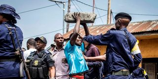 DRC police officers block anti-Rwanda protesters 