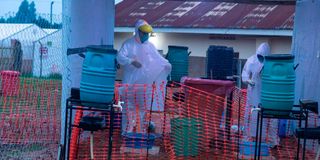 Ebola Sudan Doctors disinfecting themselves