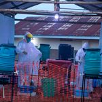 Ebola Sudan Doctors disinfecting themselves