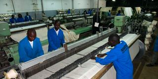 Workers at a factory in Kenya. 