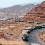 A convoy of trucks carrying food aid