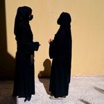 Two sisters chat in Charikar, Parwan province