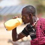 A man drinking water