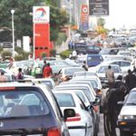 Motorists block a road in Abuja, Nigeria