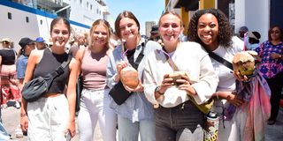 MV World Odyssey tourists enjoy madafu 
