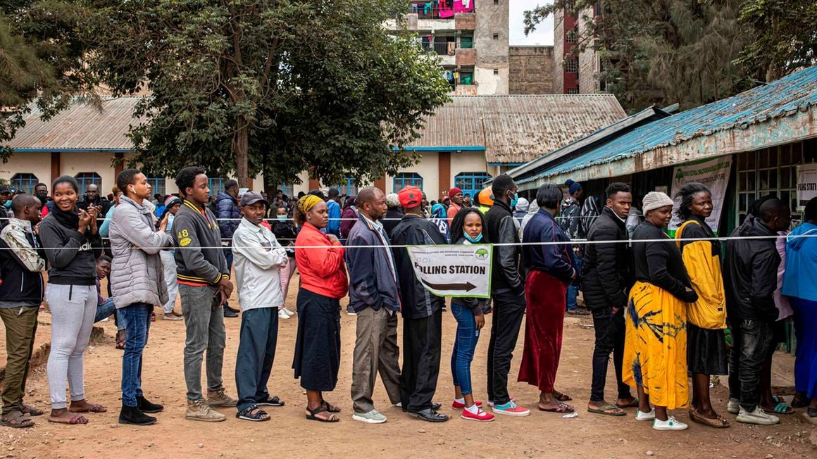 Kenyans queue to vote on August 9, 2022.