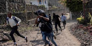 Journalists run for cover Goma protests