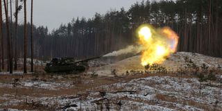 A Ukrainian tank fires at Russian positions