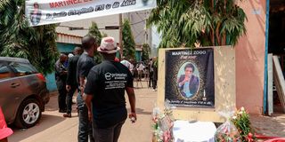 Mourners gather in the courtyard of Radio Amplitude FM