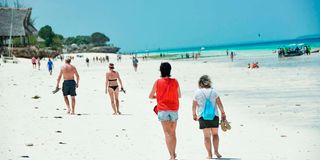 Tourists on a beach