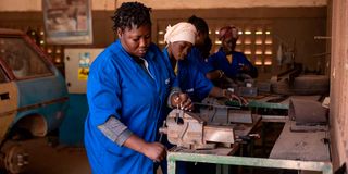Women take practical courses in mechanics 