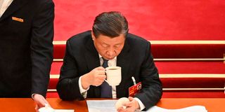China's President Xi Jinping drinks tea