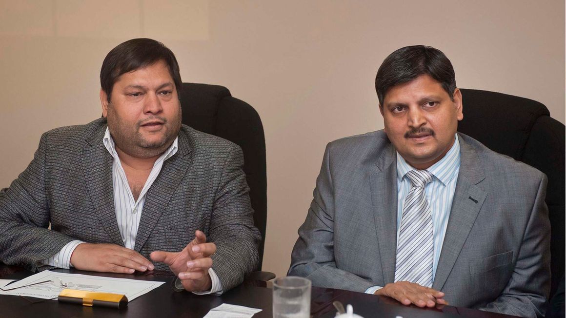 jay Gupta (left) and younger brother Atul Gupta 