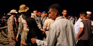 Evacuees from Sudan board a Saudi vessel on April 30, 2023.