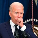 US President Joe Biden coughing