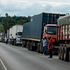 Trucks wait to enter Uganda at the Malaba border