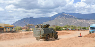 An armoured personnel carrier patrolling Kainuk town