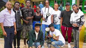 Students engage in a practical training session outdoors, learning hands-on techniques offered by Music And Film Academy.